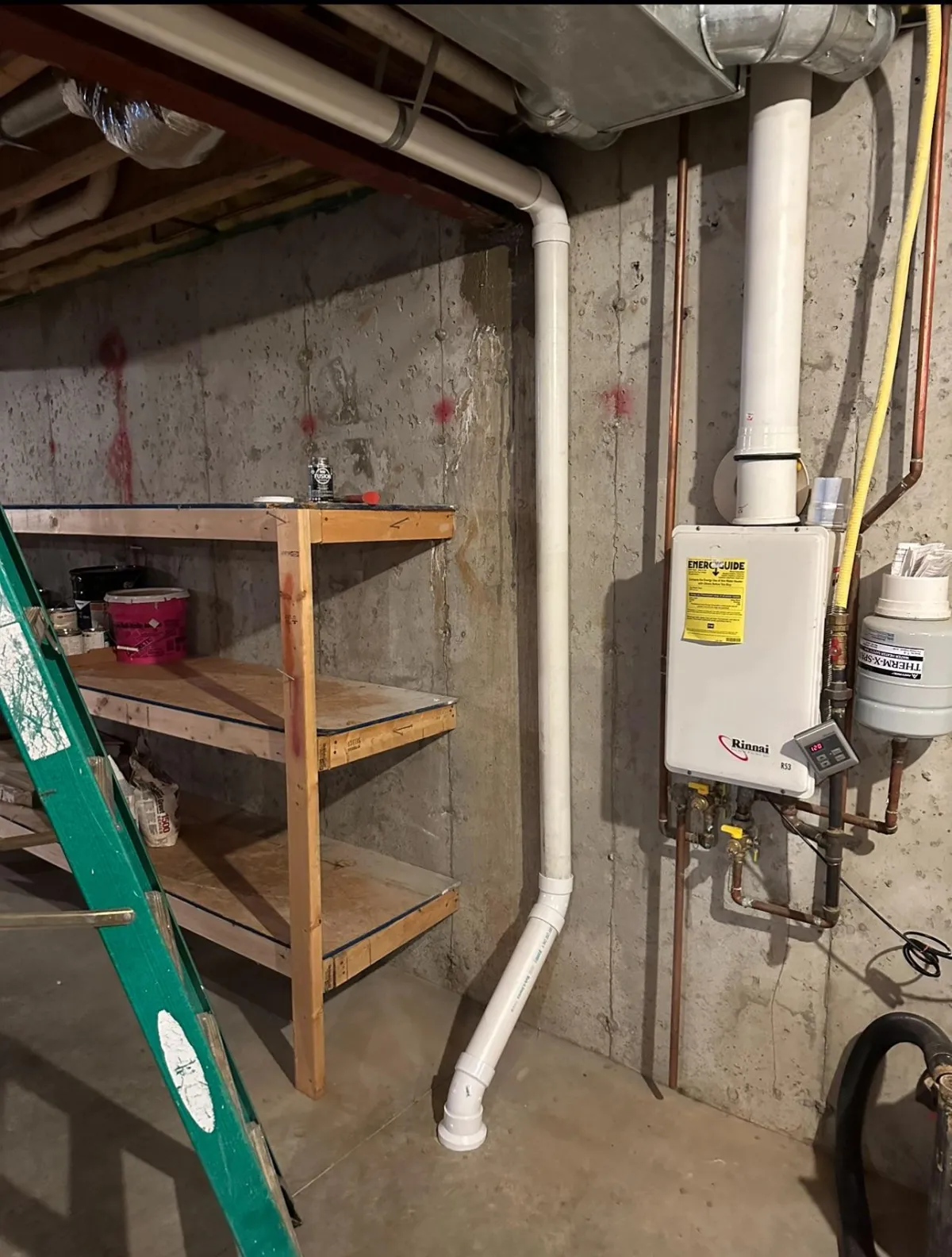 Radon piping installed in a utility room