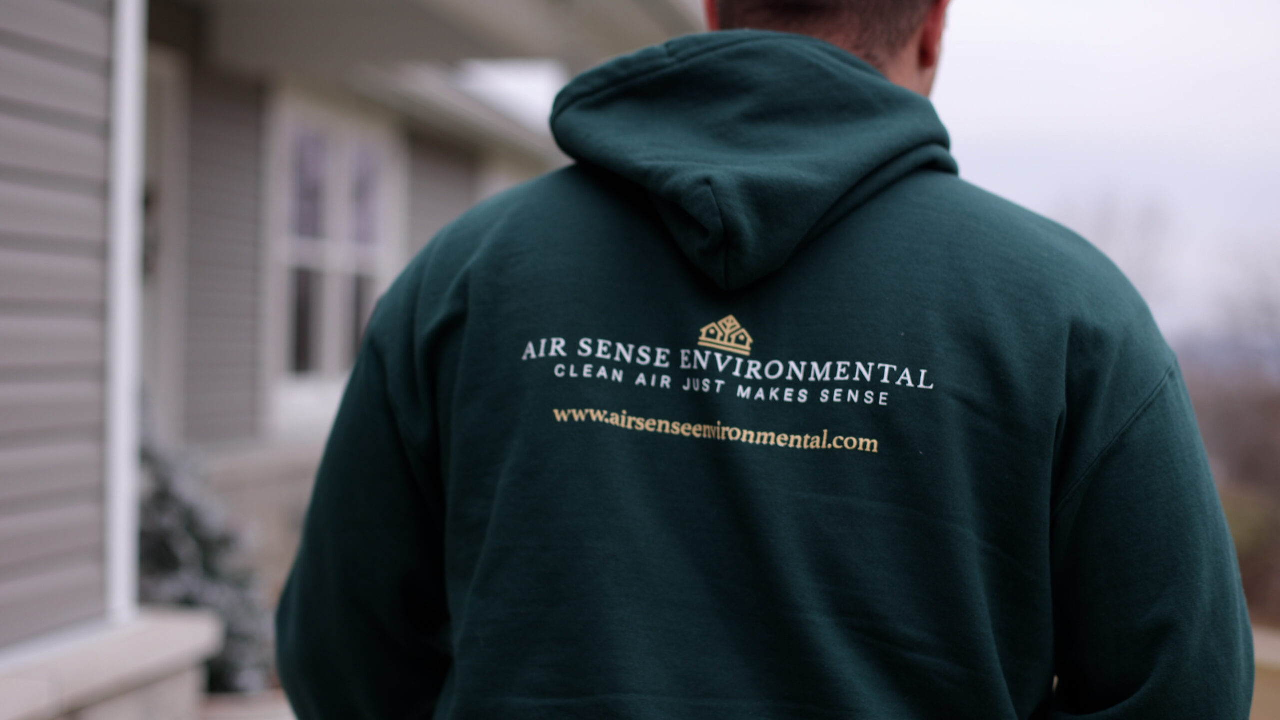 Air Sense team member in branded clothing